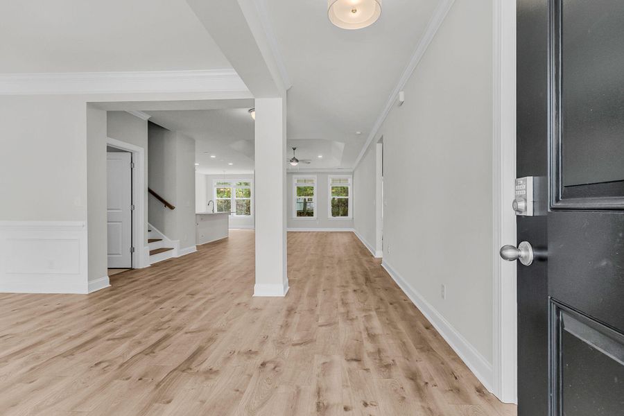 Spacious, unfurnished interior of a new home in Tidewater at Lakes of Cane Bay, Summerville (Image 25).