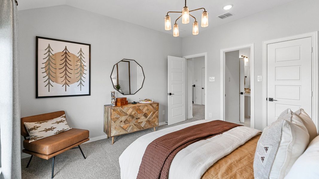 Representative furnished interior of a home built from the Magnolia by Brightland Homes in Sunterra, Katy (Image 16).