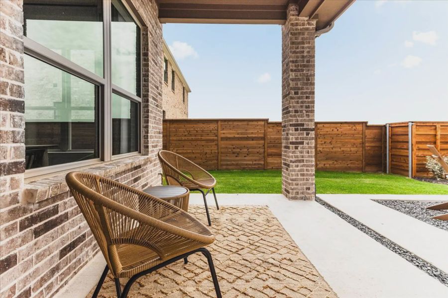 Exterior details and patio area of a home in Solterra Texas, Mesquite (Image 3).
