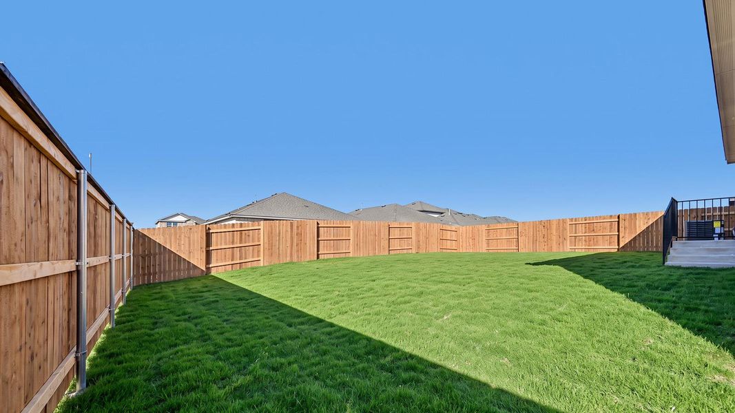 Exterior details and patio area of a home in Bar W Ranch, Leander (Image 3).