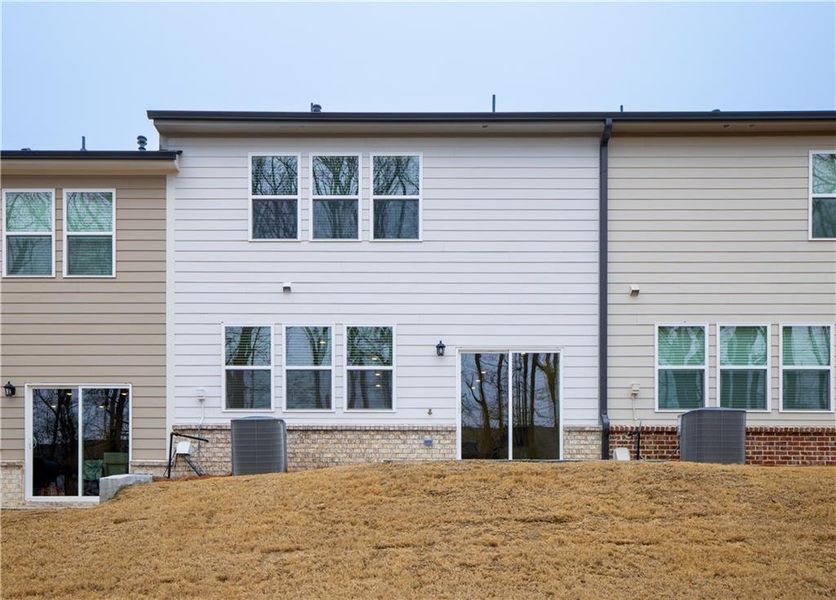 Exterior details and patio area of a home in , Buford (Image 20).