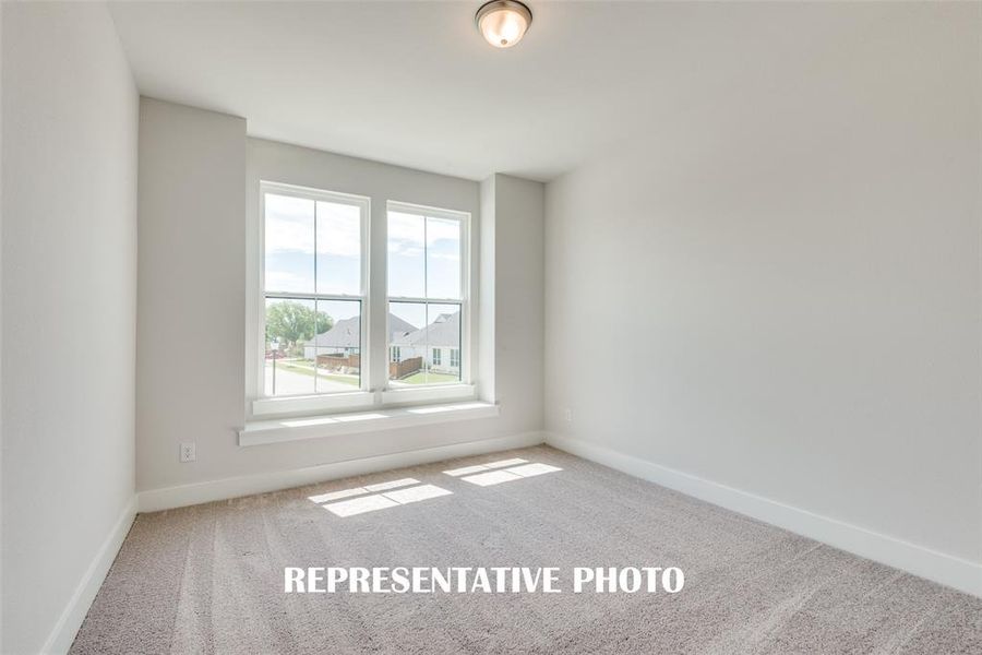 You'll find nicely sized secondary bedrooms in our Addison II floor plan.  REPRESENTATIVE PHOTO.