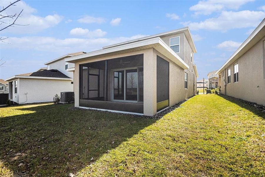 Exterior details and patio area of a home in Hills of Minneola, Minneola (Image 26).