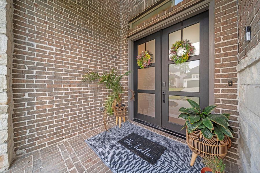 The double doors allows all the natural light at the front of the home as well as a stately entry for all. The double doors allows all the natural light at the front of the home as well as a stately entry for all.