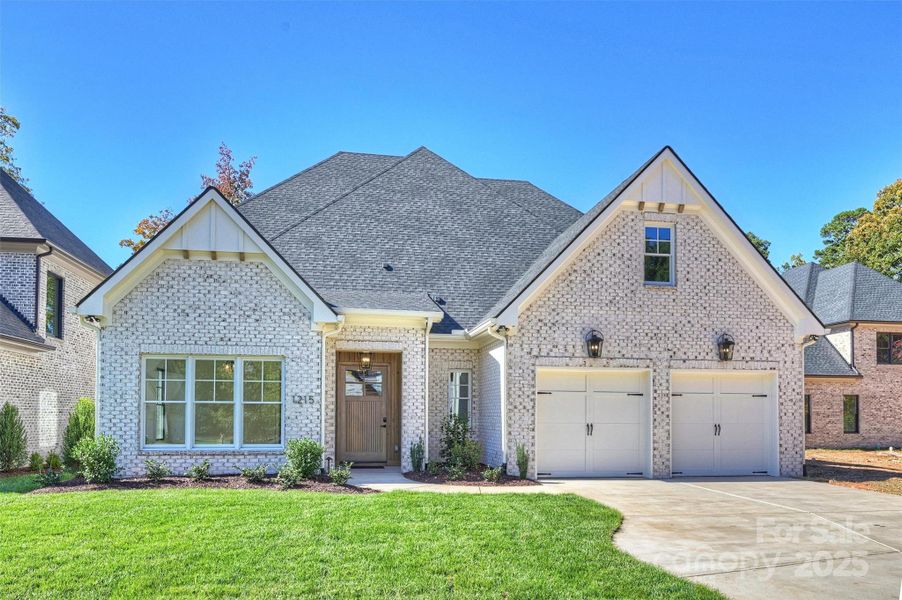 Front exterior of a new home in , Charlotte, NC, highlighting curb appeal (Image 25).