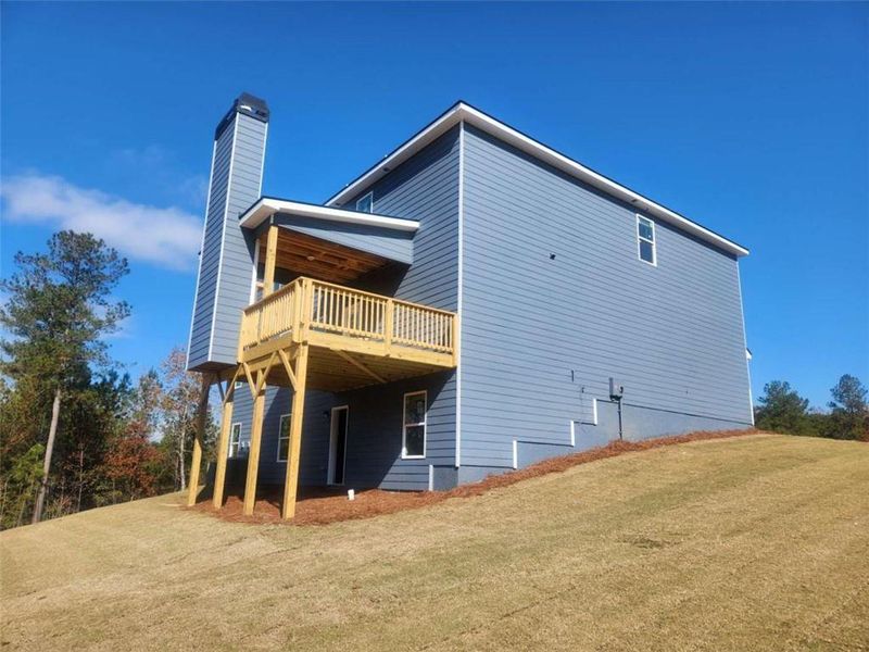 Exterior details and patio area of a home in The Woodlands Preserve, Jackson (Image 20).