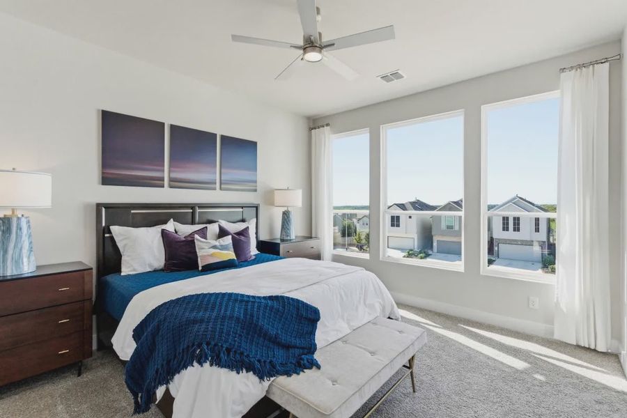 Furnished interior view inside a new home in Centero at Stone Oak, San Antonio (Image 9).
