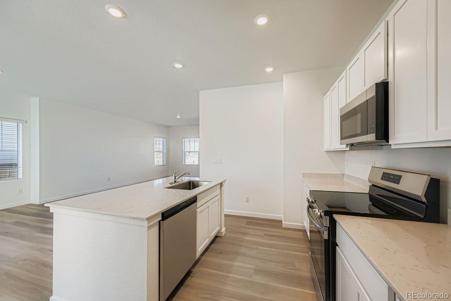 Furnished interior view inside a new home in , Thornton (Image 6).