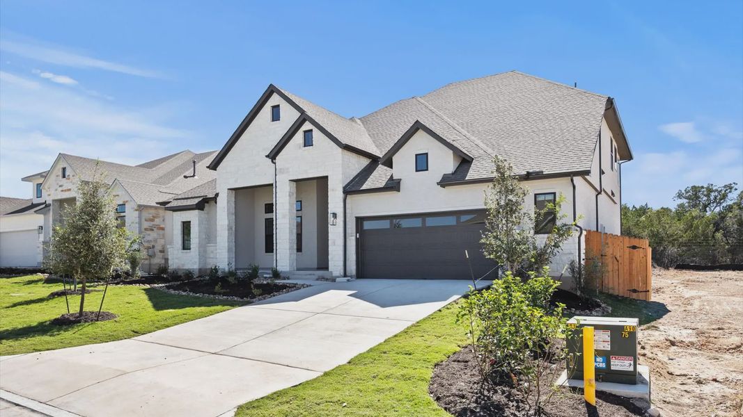 Representative exterior photo of a completed home built from the Raegan by Chesmar Homes in Sweetwater, Austin, TX (Image 2). Representative exterior photo of a completed home built from the Raegan by Chesmar Homes in Sweetwater, Austin, TX (Image 2).