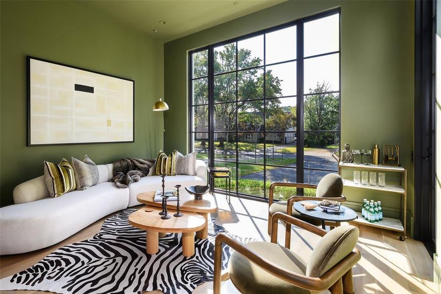 Living area featuring wood finished floors Living area featuring wood finished floors