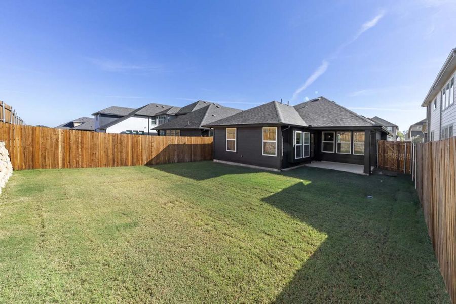 Exterior details and patio area of a home in Keeneland, Aubrey (Image 2). Exterior details and patio area of a home in Keeneland, Aubrey (Image 2).