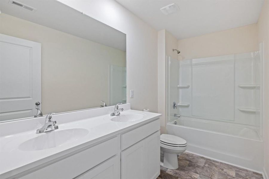 Furnished interior view inside a new home in Sheffield Highlands, Dallas (Image 14). Furnished interior view inside a new home in Sheffield Highlands, Dallas (Image 14).