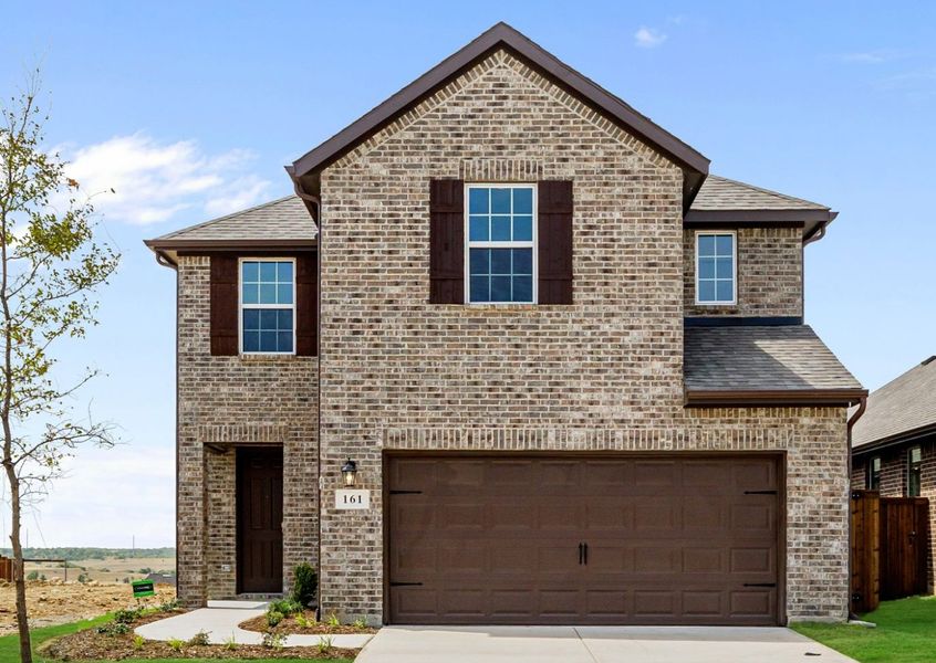 Representative exterior photo of a completed home built from the Walton by UnionMain Homes in Creekside, Royse City, TX (Image 1). Representative exterior photo of a completed home built from the Walton by UnionMain Homes in Creekside, Royse City, TX (Image 1).
