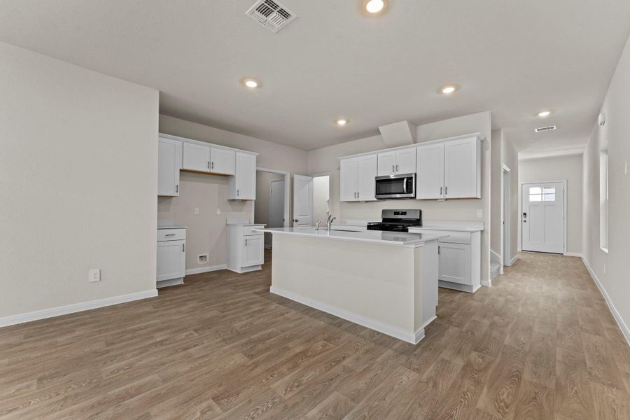 Furnished interior view inside a new home in Whisper South, San Marcos (Image 6).