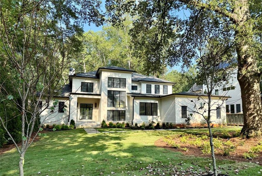 Front exterior of a new home in , Sandy Springs, GA, highlighting curb appeal (Image 2).