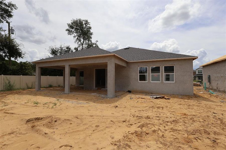 Exterior details and patio area of a home in Emerson Pointe, Apopka (Image 3).