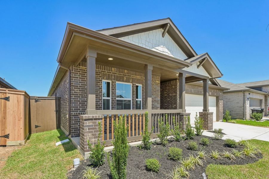 Exterior details and patio area of a home in Harrington Trails, New Caney (Image 3).