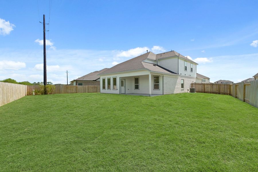 Front exterior of a new home in Briarwood Crossing, Rosenberg, TX, highlighting curb appeal (Image 1). Front exterior of a new home in Briarwood Crossing, Rosenberg, TX, highlighting curb appeal (Image 1).