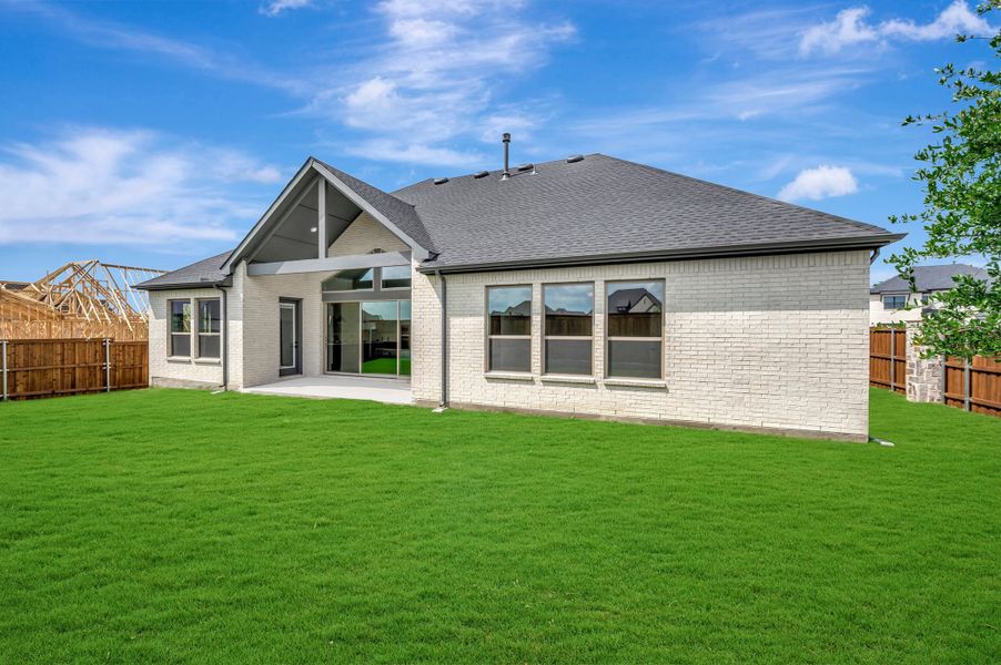 Exterior details and patio area of a home in Terraces – Estates, Rockwall (Image 3).