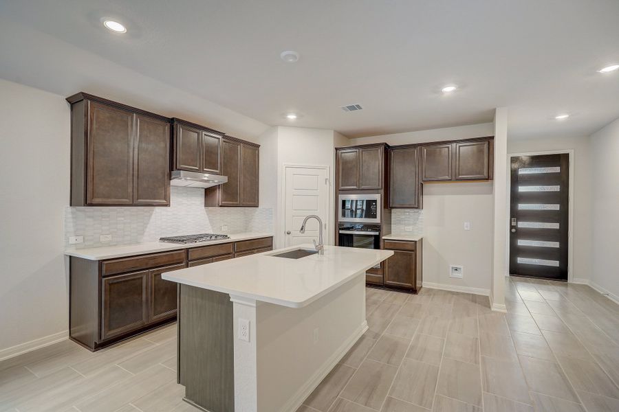 Kitchen in the Oleander floorplan at a Meritage Homes community.