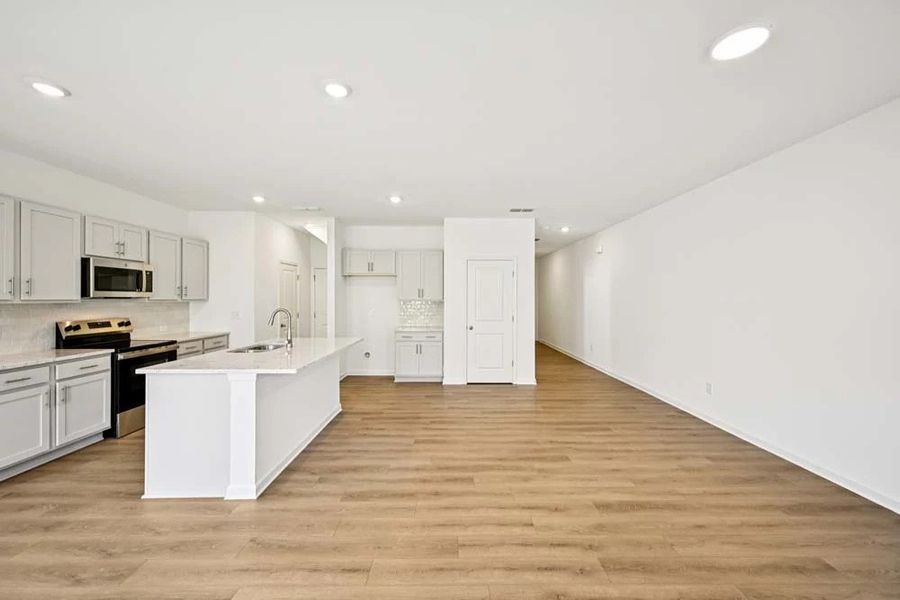 Sample Photo: Family Room & Kitchen Sample Photo: Family Room & Kitchen