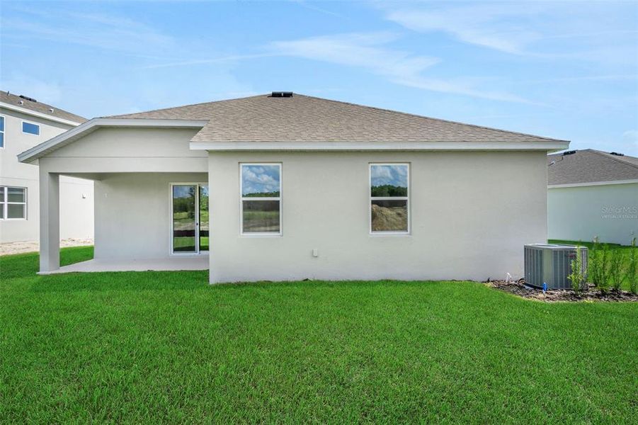 Exterior details and patio area of a home in Reserve at Hammock Oaks, Lady Lake (Image 23). Exterior details and patio area of a home in Reserve at Hammock Oaks, Lady Lake (Image 23).