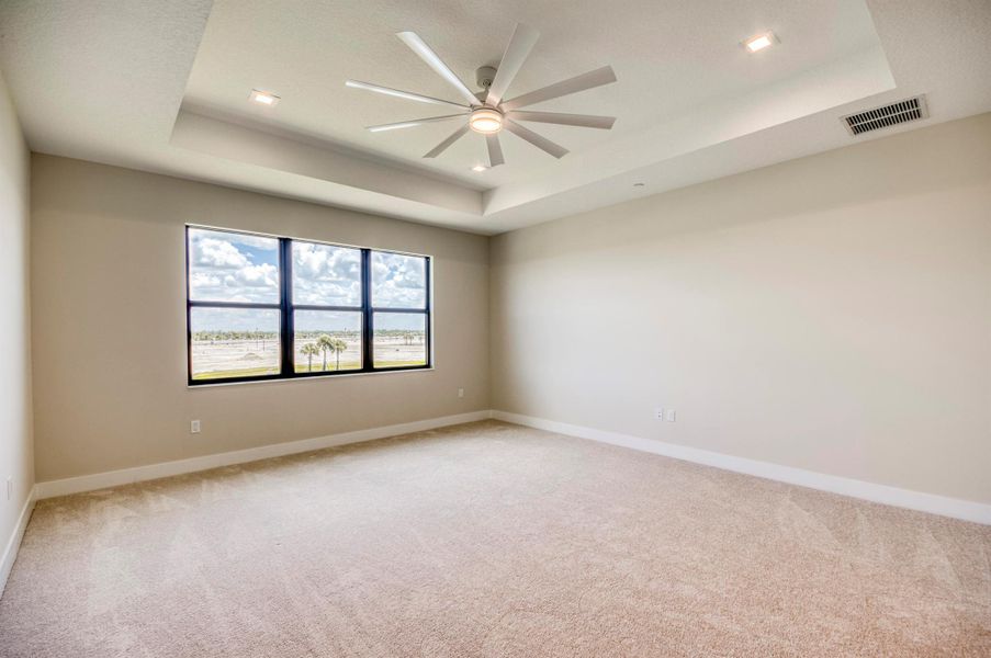Furnished interior view inside a new home in Apex at Avenir, Palm Beach Gardens (Image 28).
