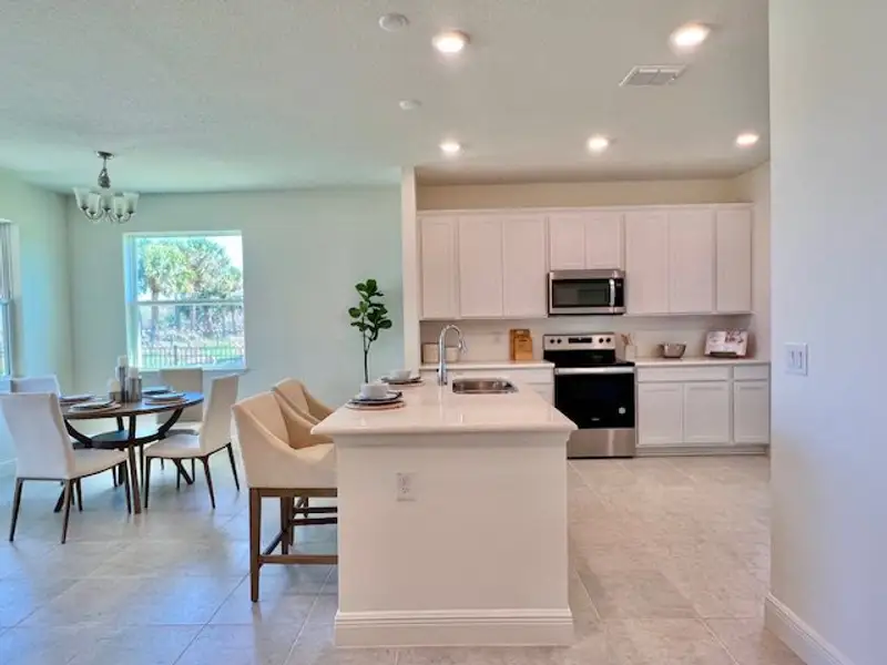 Furnished interior view inside a new home in Lakes At St Sebastian, Micco (Image 13).