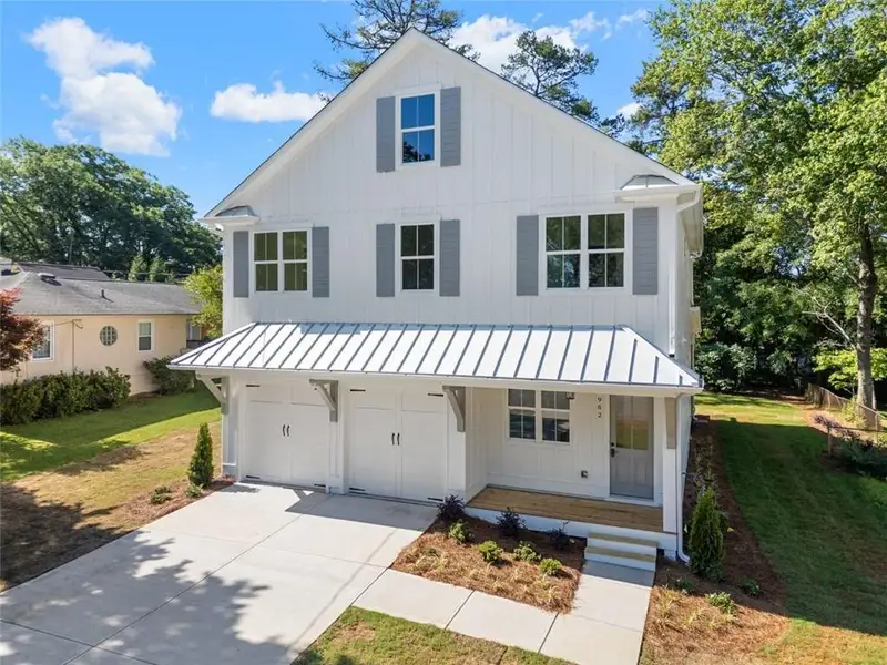 Front exterior of a new home in , Smyrna, GA, highlighting curb appeal (Image 27).