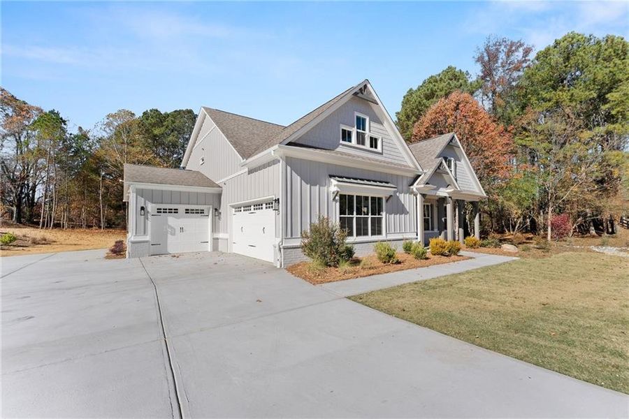 Front exterior of a new home in , Gainesville, GA, highlighting curb appeal (Image 32).