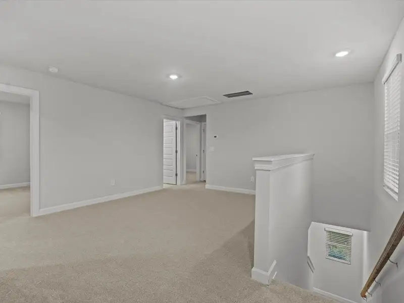 Spacious, unfurnished interior of a new home in The Farm at Wells Creek - Heritage Collection, Gray Court (Image 11).