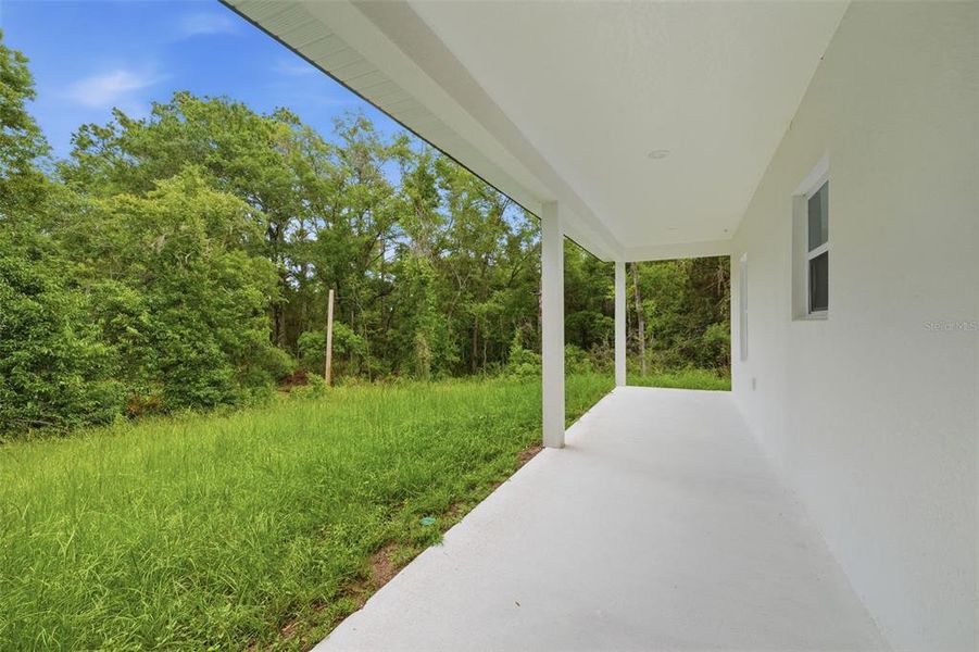 Exterior details and patio area of a home in , Citrus Springs (Image 4).