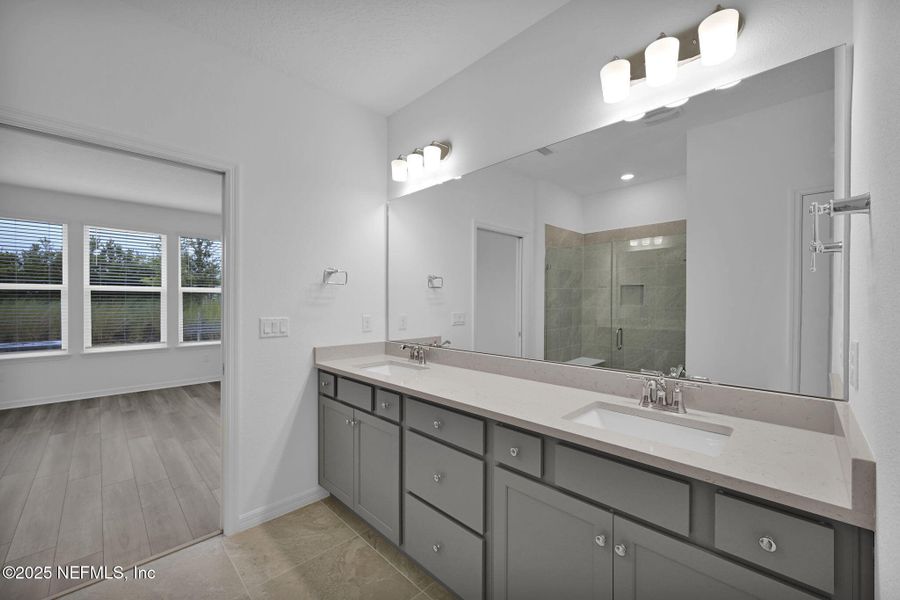 Furnished interior view inside a new home in Del Webb Wildlight, Yulee (Image 8).