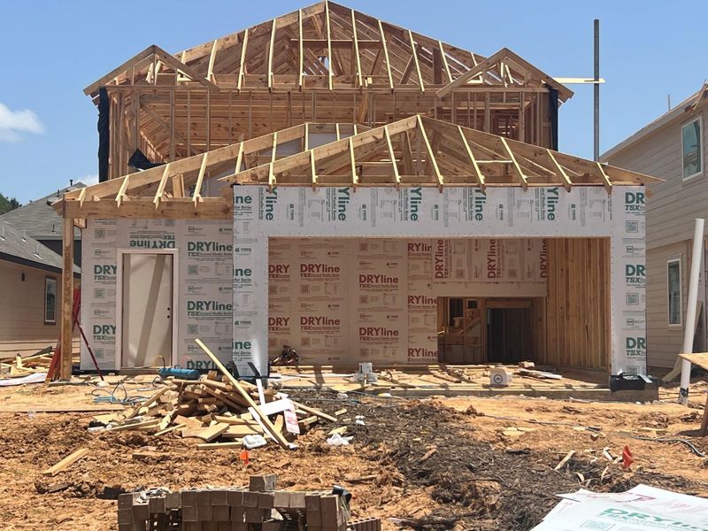 In-progress construction of a new home in Mackenzie Creek, Conroe, TX (Image 35).