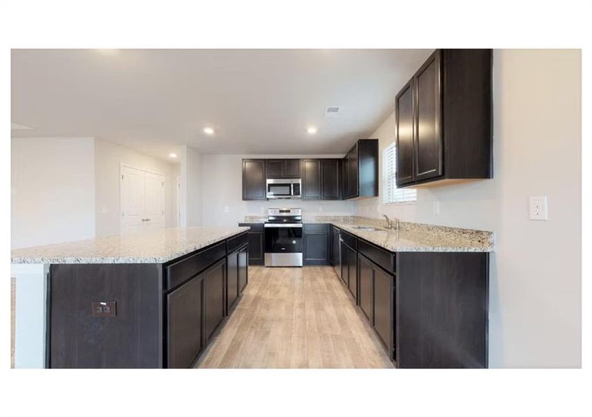 Furnished interior view inside a new home in Crossvine Village, LaGrange (Image 5).