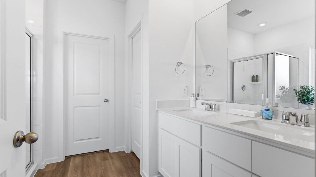 Furnished interior view inside a new home in Caldwell Crossing, Iowa Colony (Image 14). Furnished interior view inside a new home in Caldwell Crossing, Iowa Colony (Image 14).