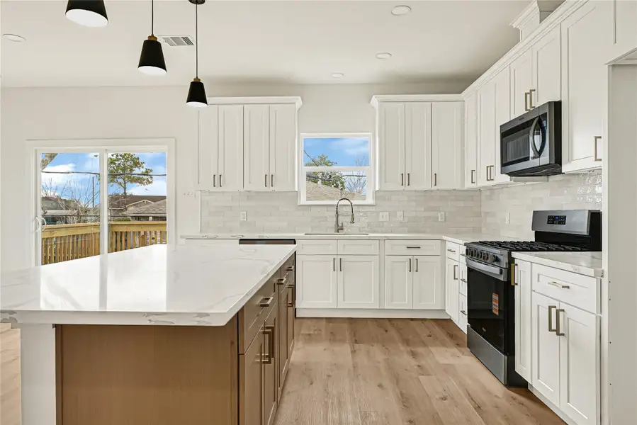 Modern kitchen with central island Modern kitchen with central island