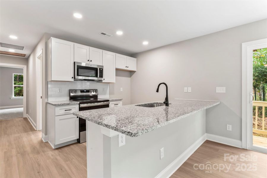 Furnished interior view inside a new home in , Albemarle (Image 6). Furnished interior view inside a new home in , Albemarle (Image 6).