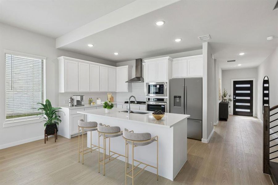 Kitchen in the Stanley II home plan by Trophy Signature Homes – REPRESENTATIVE PHOTO