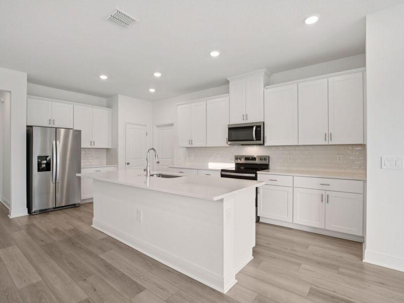 Furnished interior view inside a new home in Cyrene at Minneola - Villas, Minneola (Image 4). Furnished interior view inside a new home in Cyrene at Minneola - Villas, Minneola (Image 4).