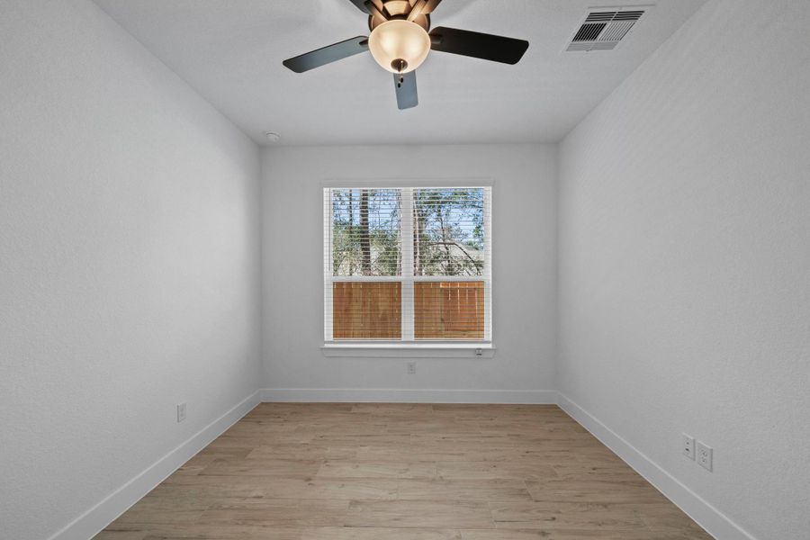 Spacious, unfurnished interior of a new home in The Woodlands Hills, Willis (Image 27).