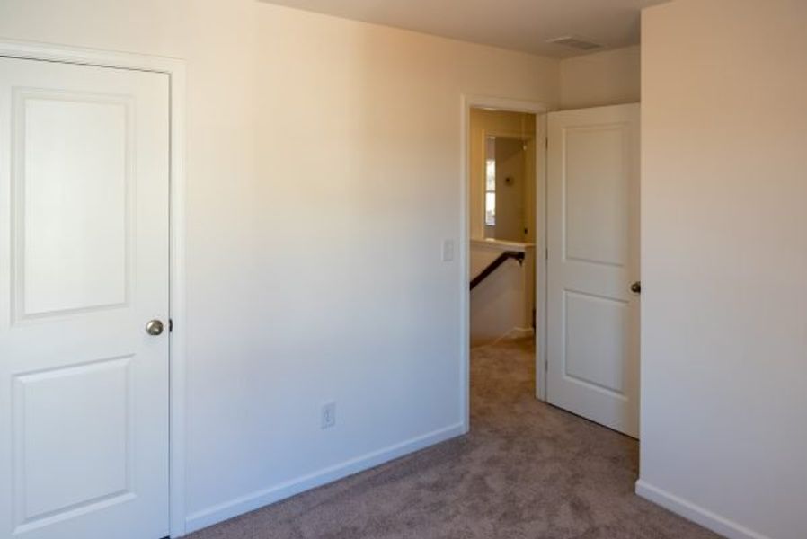 Representative unfurnished interior of a home built from the Laurel by Piedmont Residential in Meadowyn, Cartersville (Image 29).