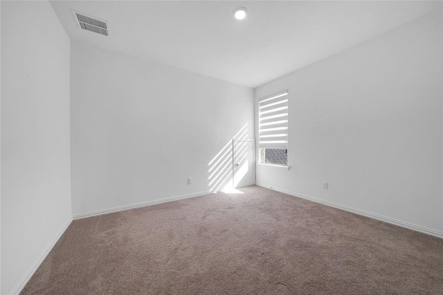 Spacious, unfurnished interior of a new home in Northlake Estates, Little Elm (Image 33). Spacious, unfurnished interior of a new home in Northlake Estates, Little Elm (Image 33).