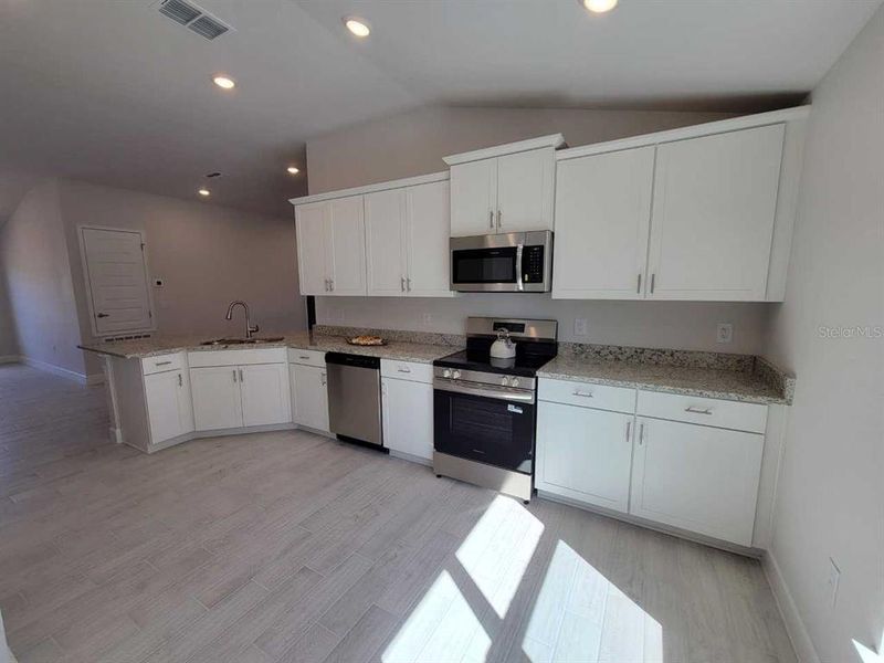Furnished interior view inside a new home in Ocala Crossings South, Ocala (Image 5).