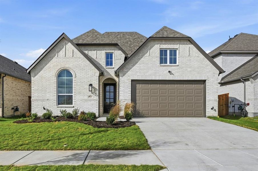 Front exterior of a new home in Wellington: Artisan Series - 50ft lots, Haslet, TX, highlighting curb appeal (Image 1).