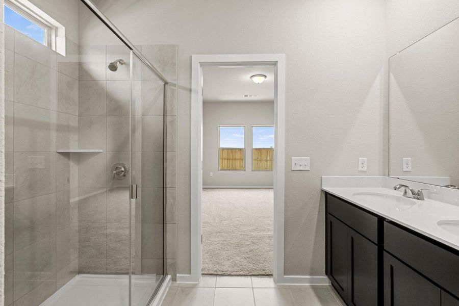 Primary Bath retreat with dual vanities & walk-in shower Primary Bath retreat with dual vanities & walk-in shower