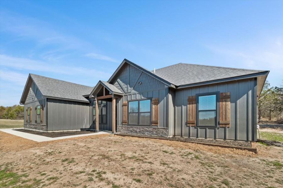 Front exterior of a new home in , Forestburg, TX, highlighting curb appeal (Image 21). Front exterior of a new home in , Forestburg, TX, highlighting curb appeal (Image 21).