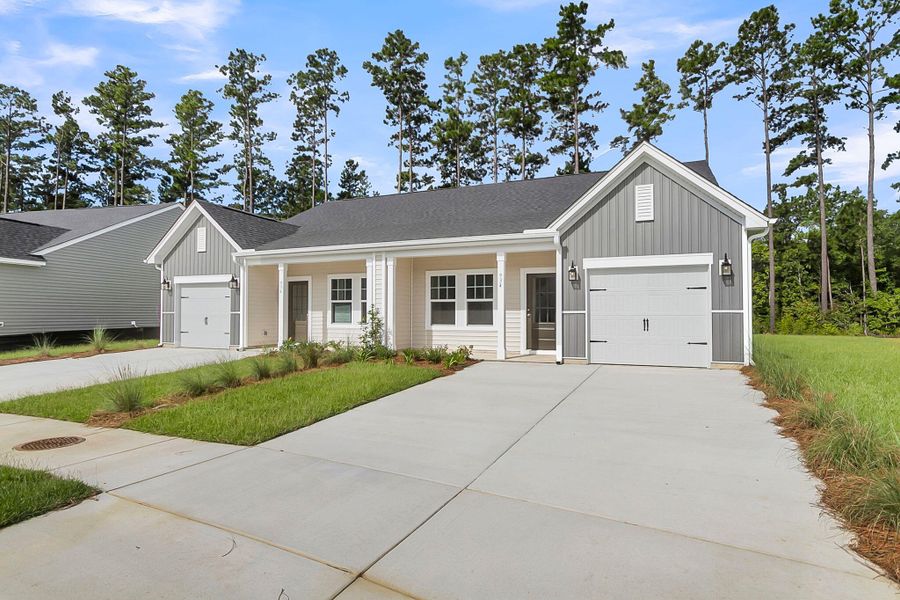 Front exterior of a new home in , Summerville, SC, highlighting curb appeal (Image 1). Front exterior of a new home in , Summerville, SC, highlighting curb appeal (Image 1).