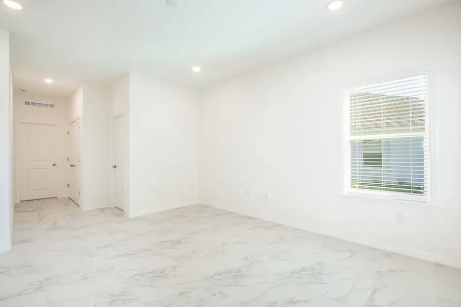 Representative unfurnished interior of a home built from the Clearwater by Maronda Homes in Vero Lake Estates, Vero Beach (Image 13).