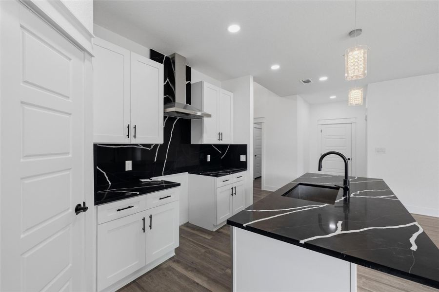 Another angle of kitchen and pantry area